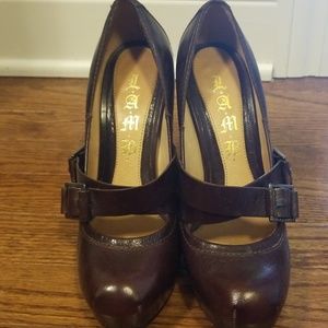 L.A.M.B. Brown platform pumps
